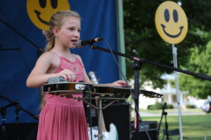 Chloe Finch, then 7 years old, opens for The Kris Lager Band at Levitt AMP Galva in 2018