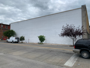 Later this summer, artists from across the country will transform this wall into a mural celebrating Middlesboro's unique history